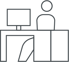 Symbolbild: Icon einer Person am Pult hinter PC